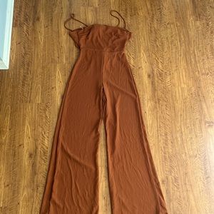 Fashion Nova Rewind It Back Jumpsuit/ Romper Rust Brown Small. Never Worn.
